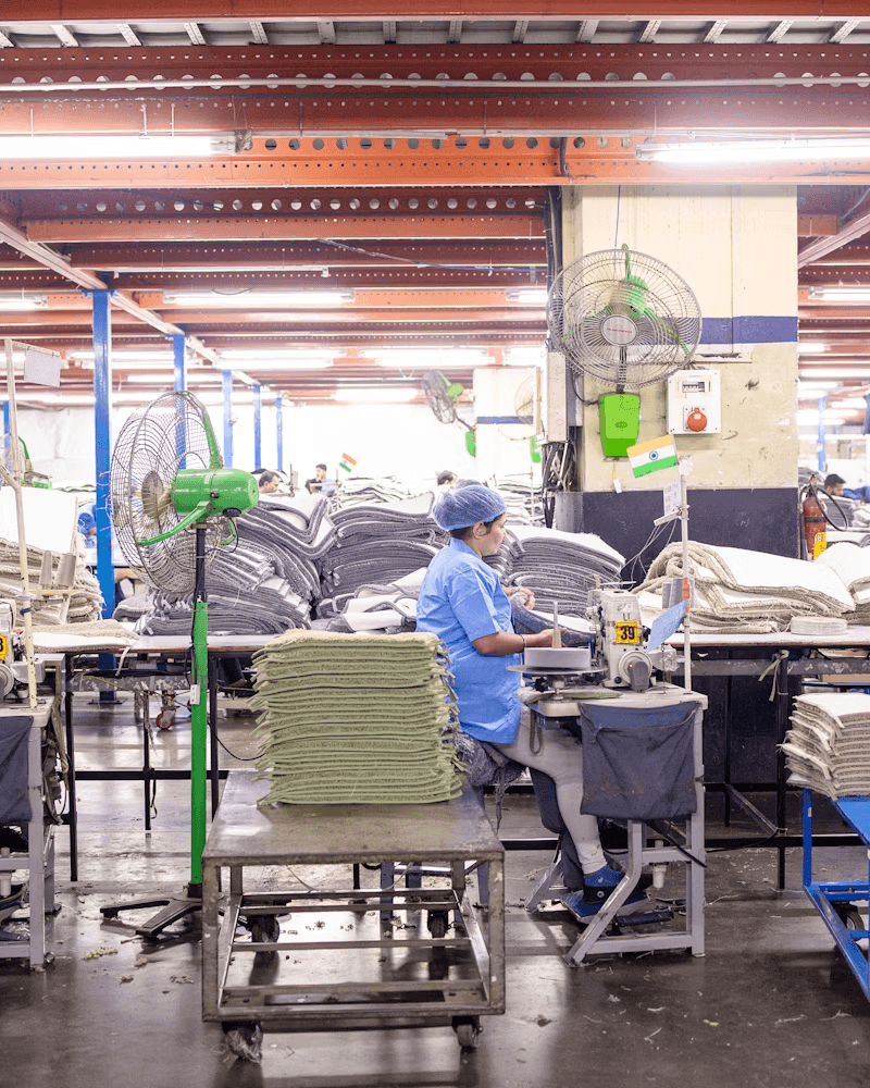 Operators packing finished components for export dispatch